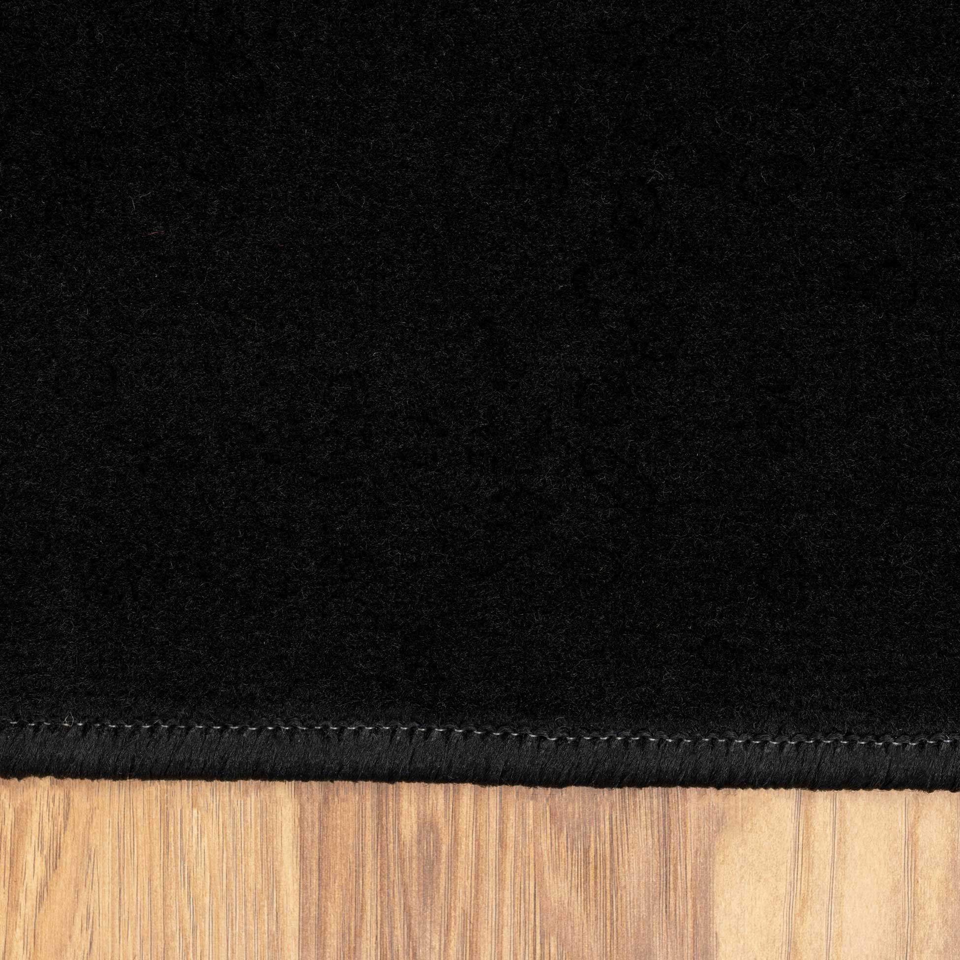 Geometric Bordered Black and Grey Rug